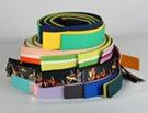 jumble of cut military belt straps