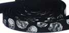 white crazy skull print on black webbing strap
